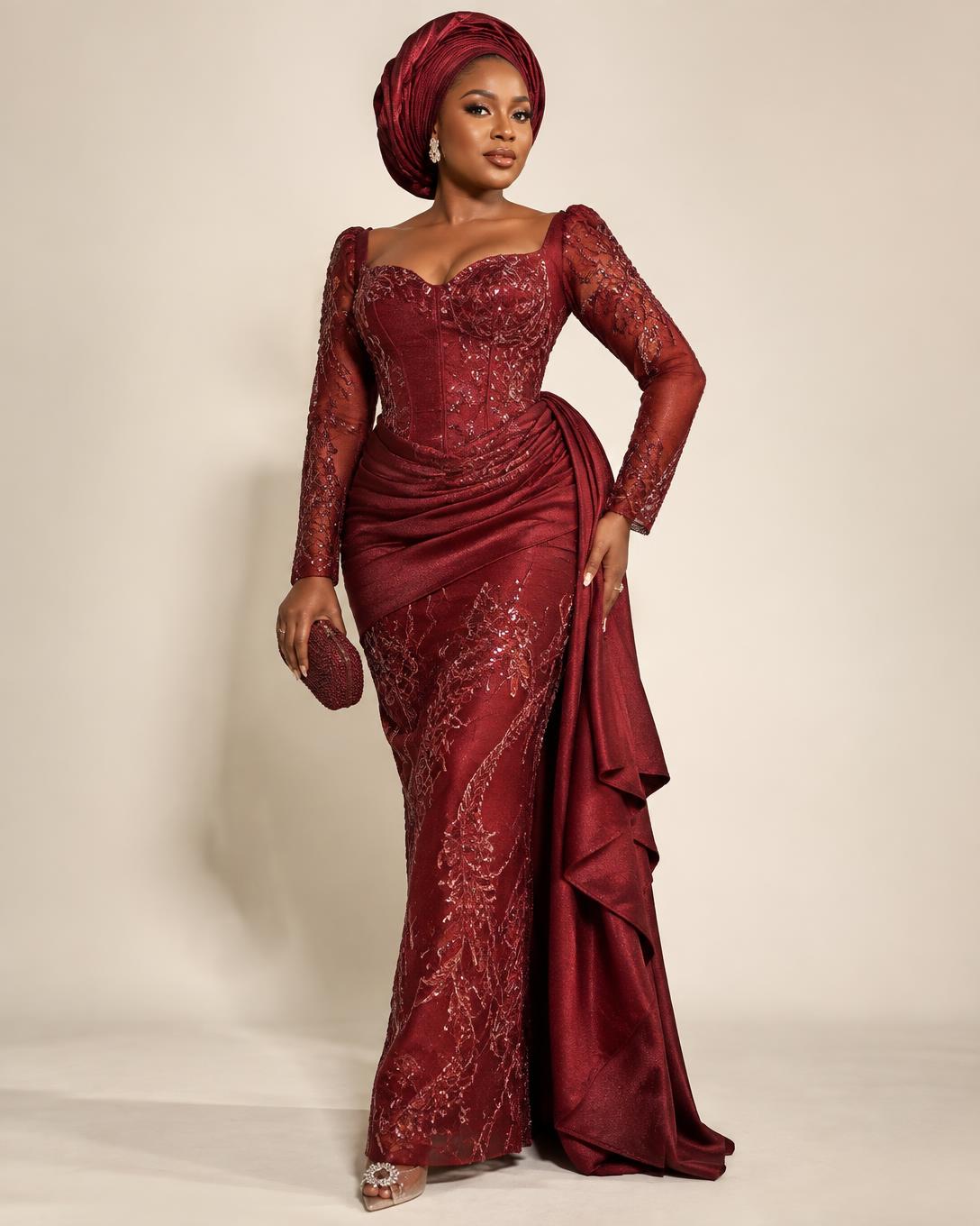 Model wearing a wine asoebi gown